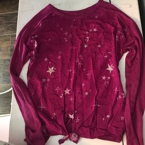 A pink long sleeve shirt